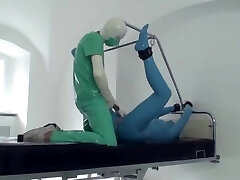 Sexy Girl Full Encased In Blue Latex Catsuit + Protection Mask And Hard Plumbed