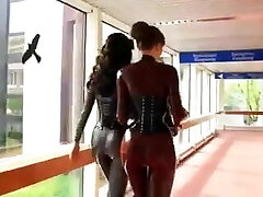 2 super-hot women in tight latex catsuits