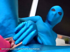 Horny Zentai doll spoiled with her new playthings to orgasm