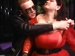 A chubby German slut with massive tits gets a long cock inside her wooly twat