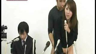 Japanese girl stretches her gams and gets naked in this contest