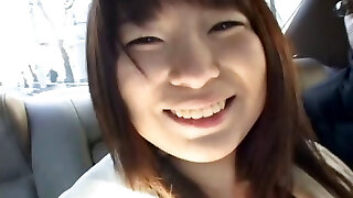Huge-chested asian having fun in a car