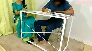 Indian Sexy teacher gives her schoolgirl a footjob and fuck