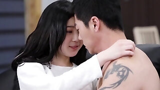 Chinese couple having sex on a couch
