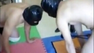 An Asian Femdom party. 2 domina with 2 slaves.
