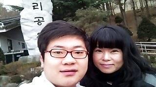 Amateur Korean duo fucks in classic missionary position on camera