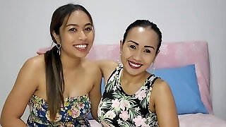 Lesbian Thai MILF GFs lick and strap on dildo