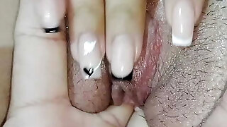 Fingering her pussy and her pooper Fingering her pussy and her pooper