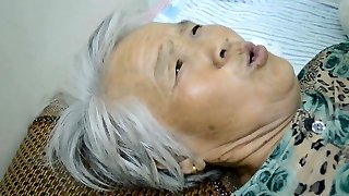 Chinese Granny With Agonizing Orgasm