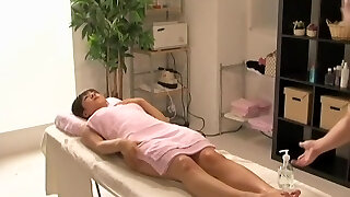 Great Japanese sex caught by a covert cam in massage room