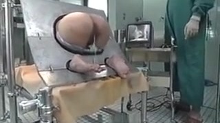 Milf Roped In A Machine And Takes An Enema In Her Bum