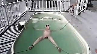 Domme Jasmine and bondage in the pool