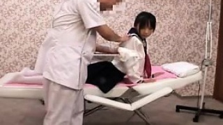 Pigtailed Japanese girl with perky orbs gets massaged and f