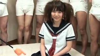 Innocent asian schoolgirl gets pussy caressed in group sex