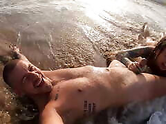 Real couple having fun on a nudist beach. big rubber wet blowjob
