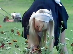 Lewd gardener proposes a blonde maid little fucking in the green grass