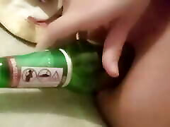 TAKING OUT A 50CL BEER BOTTLE