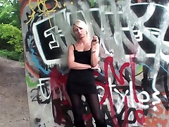 Lovely blonde teen smoking a cigarette outdoors by spy public toilet jerking Austria