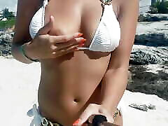 Topless on black with big beach white bikini
