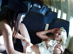 Two flight attendants on a plane play with their dildos in their post nude teens pussies