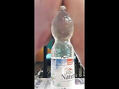 Bottle with a 90mm bulb in a complete ANAL insertion of the bulb and sample of the final result. Session 095. 20230825
