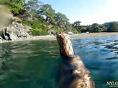 fishnet stocking in public sea and beach