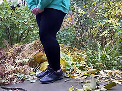 Hot Mature Woman in Leggings Pees Standing Doggystyle