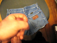 Cum on retro jean shorts while watching porn.