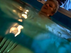 Awful blonde mature wanker called Jitka fucks her old pussy in the pool