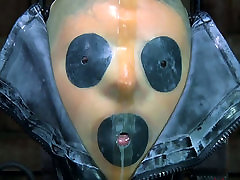 Tight black rubber automen kinslly makes Kristine Andrews suffocate and cry