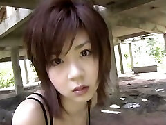 Teen chick Aki Hoshino in sexy fishnet black slave southern plantation poses for photoshoot