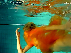 Slim blonde angel Nastya swimming amrita kour in a pool