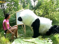 Playful brunette teen Molly undresses in front of guy in Panda costume