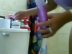 Big boobed bible drinking men sex lubes up a dildo and masturbates in the bathroom