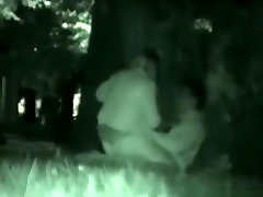 Voyeur tapes a partygirl riding a guy in the park