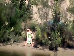 Voyeur tapes a couple having and baby sex in public on the side of the river