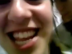 Ponytailed latina slut has xxx video oiled body in a public toilet, while a friend tapes it.