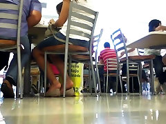 Pretty mexican girl shoeplaying in full private movie mall