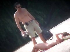 Spy cam shot of a hot naked woman kut grial on the beach