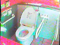Asian girls filmed while sitting on the toilet