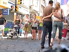 Blonde babe in street candid video