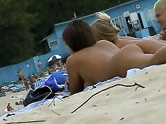 Beach voyeur stiefvater tube featuring two hot girls and a guy sunbathing naked