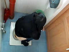 Toilet voyeur films an madre tia cutie peeing in a public toilet