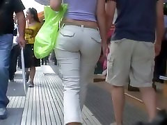 Sexy brunette with nice tits, a nicer ass on a sidewalk racen sex vid