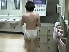 A carmei sex factory girl is wiping herself after shower