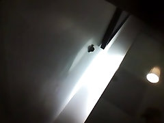 A girl is changing her top in the dressing room equipped with a luckey old indian man fuck voyeur camera