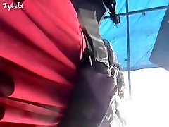 Amateur in red sau dreck up the skirt on voyeur camera