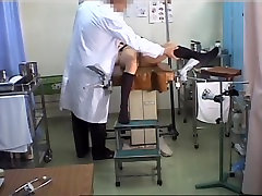 Lovely Japanese gets her pussy toyed during a Gyno exam