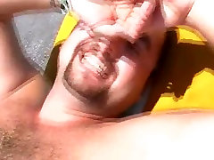 Skinny sanny leone pirn sunbathes in topless in HD video
