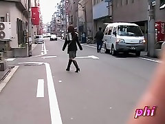 Street sharking exposes sexy black panties on a Japanese gal